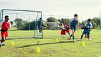 Children, running and sports practice on field with resistance, strength training and fitness exercise. Kids, equipment and soccer workout for endurance, speed challenge and team with cardio routine