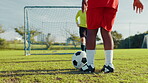 Kid, kick and ball in net for soccer practice of team training, exercise and sports competition. Children, goalkeeping and workout for scoring goal, match tournament and learning skills of challenge