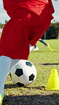 Kid, dribble and ball for soccer practice for training, kick and fitness exercise. Active child, equipment and cones for drill of sports workout, skills technique and learning agility for match game