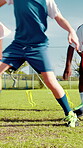Legs, kids and running for soccer practice, dribble training and fitness exercise. Children, teamwork and drill for sports workout, skills technique and learning agility for game challenge on field