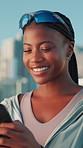 Black woman, phone and happy for fitness in city with search for direction, training and map in summer. Person, runner and smartphone for workout, exercise and mobile app on urban road in Kenya