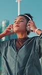 Jog, fitness and woman with headphones in city for music, streaming podcast or motivation for sprint. Runner, cardio and athlete outdoor with sound for workout, start running and training to exercise
