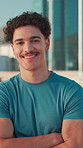 Man, face and arms crossed for exercise in city with pride for training, start and confident in summer. Person, runner and happy in portrait for workout, fitness and ready for road marathon in Mexico