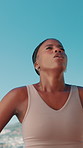 Fitness, black woman and tired with breathing outdoor for workout fatigue, running recovery and cardio break. Blue sky, athlete and sweating for endurance challenge, marathon performance or exhausted