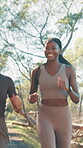 Running, team and smile with friends in nature for training, marathon practice and support. Sports athlete, fitness partner and wellness with women on forest path for runner workout and exercise