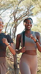 Running, team and health with friends in nature for training, marathon practice and support. Sports athlete, fitness partner and wellness with women on forest path for runner workout and exercise