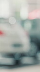 Blur, retail and purchase with cars at dealership for test drive, auto showroom and vehicle decision. Sales, automobile and transport choice with  store for rental agreement, shopping and driver lot