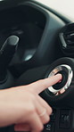 Hand, push button and start car for travel, journey and self driving with keyless technology. Electric ignition, person or press switch for engine power, transport or autonomous motor vehicle closeup