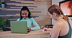 Happy women, gym and receptionist with application on laptop for membership or sign up at front desk. Female people, client or registration with computer, form or survey for policy at health club