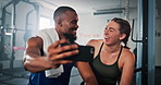 Fitness, couple and laughing with selfie at gym for workout progress post, social media update and training memory. Interracial people, happy and photography for muscle goals and app profile picture