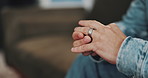 Divorce, hands and man with ring, counselling and toxic marriage with relationship, sad and frustrated. Closeup, anxiety or person with stress, infidelity or secret affair with jewelry or explain