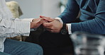 People, therapist and holding hands with patient for discussion, counseling or therapy session. Closeup, counsellor and client with touch, comfort or trust for empathy, understanding or support