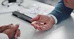 Psychology, people or hands with tablet, pills or solution for illness, mental health client and help. Medicine, therapy and psychiatrist talking to person for drugs, medical dose or instructions