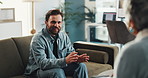 Therapy, talking and happy man with therapist in office for consulting, advice and emotional support. Psychology, mental health and woman with patient for listening, help and and counseling session