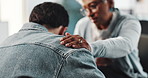 Hand, shoulder of patient and therapist in session together for counseling, mental health or support. Empathy, help or psychology with counselor and person in office for grief, loss or pain closeup