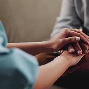 Therapist, holding hands and senior patient for counselling, comfort ...