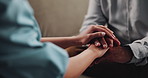Therapist, holding hands and senior patient for counselling, comfort and support with grief at clinic. People, psychology and consultation for mental health, anxiety and kindness with care at office