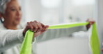 Hands, rehabilitation and resistance band with mature woman in class for exercise or training. Health, fitness and wellness with person stretching equipment closeup for flexibility or recovery