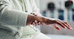 Elderly hands, wrist pain and arthritis in home with stretching, touch or inflammation in retirement. Senior person, joint ache and massage with muscle fatigue, injury and carpal tunnel at house