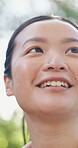 Hiking, thinking and smile with asian woman in nature for explore, adventure and reflection. Inspiration, eco destination trip and trekking with person in forest for wellness, peace and fitness