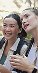 Relax, coffee and hiking with friends in nature for birdwatching, eco tourism and tour guide. Happiness, adventure and backpacking with women in forest for migration season and wildlife conservation