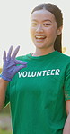 Woman, volunteer and smile with ok hand for student with outdoor, community work and earth day event. Female person, charity support and happy for skill development, recycling and university break