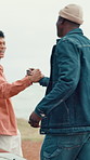 Car, travel and men friends with handshake for greeting, celebration and getaway road trip. Happy, people and shaking hands with hug in vehicle for respect, vacation success and bonding on adventure 