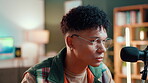 Influencer, glasses and online with man in studio for content creator, editor or broadcast. Subscription, live streaming and social media with person in home for hosting platform and sound production