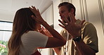 Angry, fight and couple with argument in home for toxic marriage, blame and disagreement. Divorce, liar and frustrated people with conversation, relationship betrayal and conflict for cheating affair