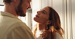 Love, romantic and couple with dancing in kitchen for bonding together, connection or flirting. Trust, people and affection in home with comfort, loyalty and streaming music for marriage anniversary