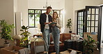 Couple, reading and tablet with boxes at new house for planning, online shopping and renovation ideas. People, discussion and digital for research, interior design and decoration of remodeling choice