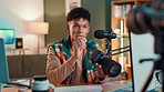 Content creator, microphone and camera with man in studio for influencer, advice or broadcast. Subscription, live streaming or photography review with person in home for hosting platform and talking