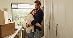Celebrate, boxes and couple hug in new home with property, investment or loan success. Moving, romantic or people in relationship with embrace, tenant or real estate for relocation or love in house