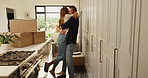 Celebrate, excited and couple hug in new home with property, investment or loan success. Happy, milestone or people in relationship with security, smile or real estate for relocation or love in house