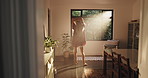 Dance, sunshine and back of woman by window with music for freedom, relax and happiness. Morning, bedroom and person in home ready to start day with energy, confidence and movement for celebration
