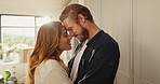 Romantic, happy and couple hug in new home with property, investment or loan success. Moving, celebrate or people in relationship with security, smile or real estate for relocation or love in house
