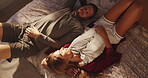 Comfortable, couple and relax on bed in home, above and romance on free time, bedroom and apartment. Rest, man and bonding with woman on honeymoon, break and happy for commitment in relationship