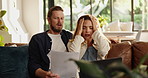 Frustrated couple, documents or stress with laptop on sofa for financial crisis, bankruptcy or debt. Upset, woman and man with paperwork or computer for poor finance, bad investment or tax inflation