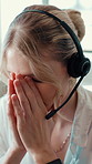 Woman, stress and call center agent in office with online consultation for crm, helpdek or advice. Headset, customer service and female technical support consultant with burnout for troubleshooting.
