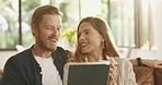 Conversation, tablet and couple on sofa in home for networking online together in living room. Happy, technology and man with woman for relax with connectivity on mobile app or social media in house.