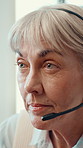 Mature woman, headset and call center consultant in office with online consultation for crm, helpdek or advice. Audio tech, customer service and female technical support agent with troubleshooting.