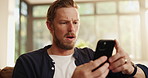 Man, phone and surprised with bad news in home with doubt, reading fake email or phishing scam. Sofa, person or shocked with smartphone for online announcement, internet glitch or mobile notification
