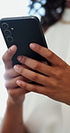 Cellphone, hands and businesswoman in office with communication, contact or networking online. Phone, closeup and female creative designer with email for client feedback on magazine publishing.