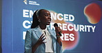 Conference, presentation and black woman with cyber security, speaker and software update. African person, speech or presenter in seminar, mic or progress for tech, about us or expert with solution