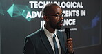 Presenter, black man and talking at conference event for technological advancements in insurance. Public speaking, presentation and live summit, automation pitch and claims process of fraud detection