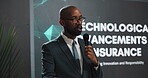 Presenter, black man and speech at conference event for technological advancements in insurance. Public speaking, presentation and live summit, automation pitch and claims process for fraud detection