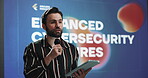 Man, talk and speech with tablet at conference event for enhanced cybersecurity measurement. Public speaking, presentation and online for information, data protection and innovation of digital safety