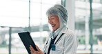 Woman, doctor and medical research with tablet, hospital and browsing digital records for diagnosis. Healthcare, scroll and person with tech for treatment plan, online and checking appointment