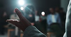 Public speaking, hand and person with motivation for crowd, politician or presentation for audience. Press conference, legislator and announcement on stage for official event, talking and podium