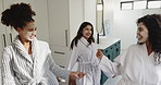 Happy women, dancing and bathroom at spa with fun energy or satisfaction together at resort. Excited, female people or group of friends in joy with face mask for morning or beauty treatment at hotel